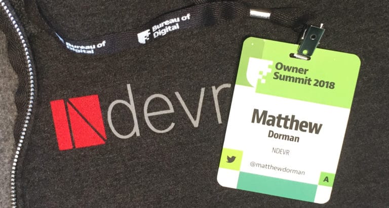 Owner Summit Badge over an Ndevr Hoodie