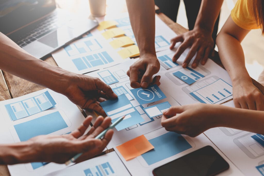 A web development team working together on the concept and design