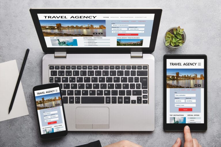 Travel agency media platform displayed on laptop, tablet and smartphone screen