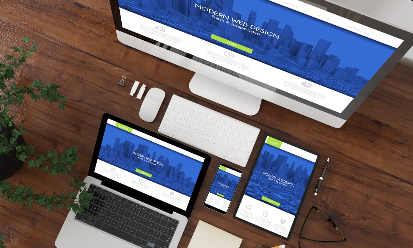 PWA for WordPress: Responsive website shown on computer monitor, laptop, tablet, and mobile phone.